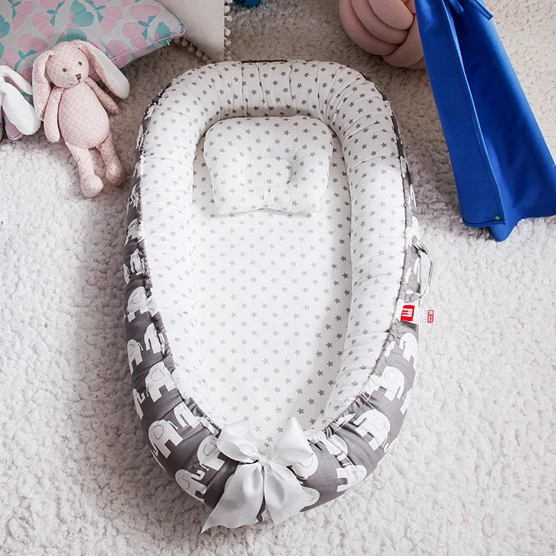 Baby-Nestbett 85×50 cm – Reisebett mit Kissen & Bettumrandung