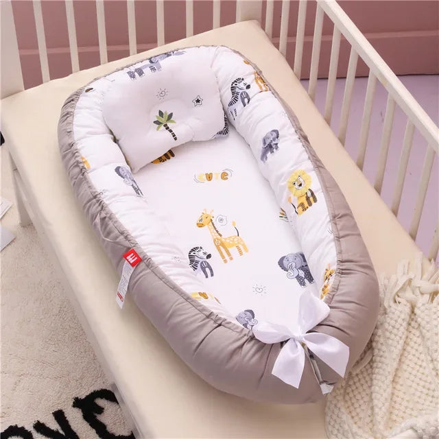 Baby-Nestbett 85×50 cm – Reisebett mit Kissen & Bettumrandung